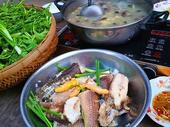 Tiền Giang’s snakehead porridge with bitter vegetables, a regional specialty