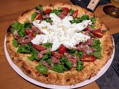 Japanese fusion pizza wins diners’ hearts
