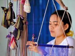 Ninh Thuận artisans restore old patterns on Chăm brocade