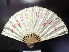 Museum displays embroidery items by Vietnamese women soldiers