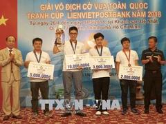 Minh wins two titles at national chess tourney