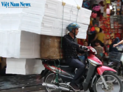 Overloaded mopeds in Việt Nam
