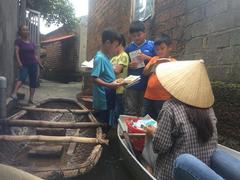 Library fights flood to deliver books by boat