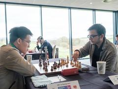 Grandmasters Liêm, Sơn takes positive results at Grand Swiss