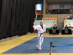 Master Để earns taekwondo’s highest black belt dan