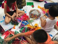 Making traditional lanterns to gift children in rural areas