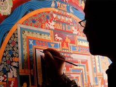Buddhist thangka paintings on display at Pháp Vân Pagoda