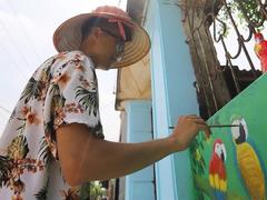 Young artists give Hà Nội village a new coat of paint