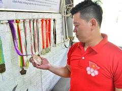 Weightlifter's Olympic medal arrives 9 years late