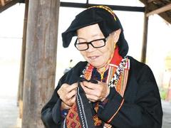 Ethnic woman helps preserve traditional embroidery