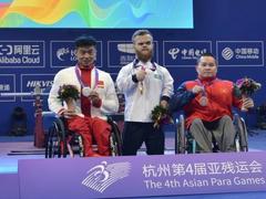 An hungers to lift Paralympics medal