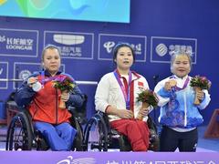 Phượng takes silver in powerlifting, Hằng earns bronze in swimming