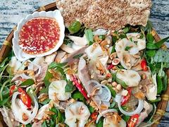 Foodies flock to Bình Dương to enjoy mangosteen chicken salad