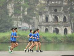 Runners ready for Standard Chartered Hà Nội Marathon Heritage Race