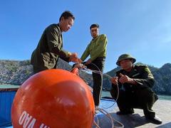 Releasing buoys to protect coral reefs in Cát Bà National Park