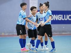 Vietnamese female futsal players get ready to take a shot at the first-ever World Cup