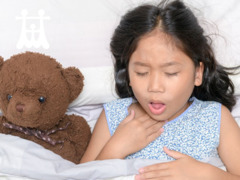 Girl with thick, grey coating of dead tissue building up in the throat