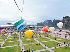 Tourists enjoy first colourful hot balloon festival